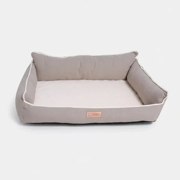 Panier chien confortable gris avec rebords rembourrés par Oscar et Plume pour le bien-être de votre animal