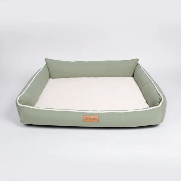 Panier chien confortable vert olive avec coussin doux et bordures rembourrées par Oscar et Plume
