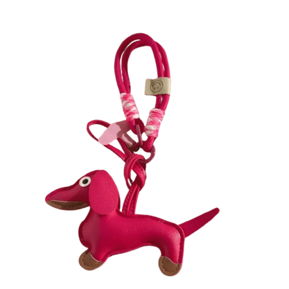 Porte-clés original teckel rose vif en cuir avec cordelette et détails contrastants