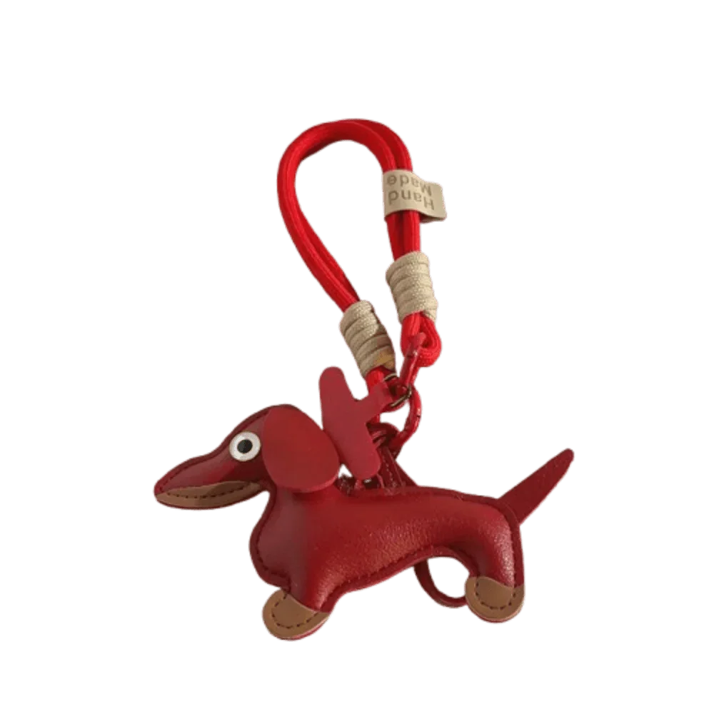 Porte-clés original teckel en cuir rouge avec œil blanc et attache corde rouge par Oscar et Plume