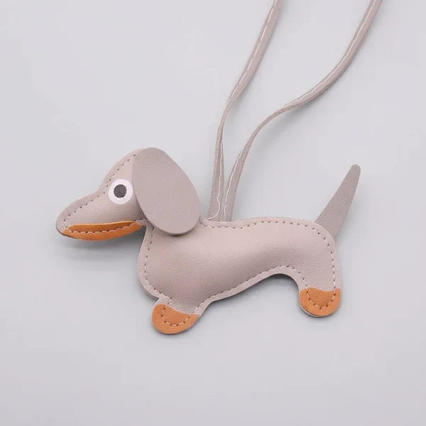 Porte-clés teckel cuir gris avec des détails orange pour les amoureux des chiens